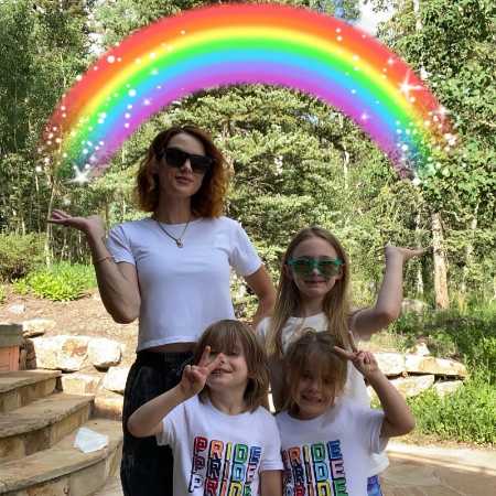 Zeppelin Bram Ackles with his siblings and mother wearing Pride t-shirt
